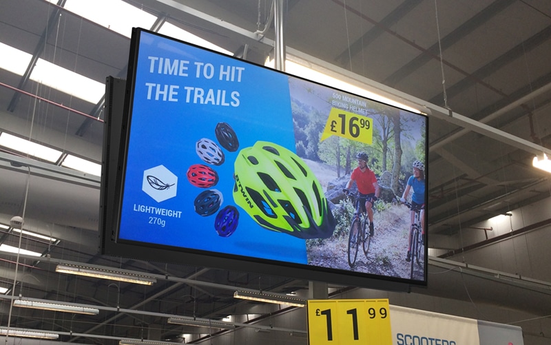 Digital Display Signage - Hero blue awning on high street shop
