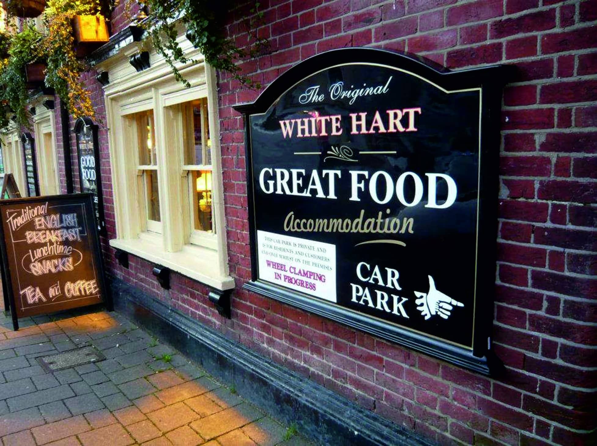 GRP:Fiberglass Moulded Panel Signs - Hero blue awning on high street shop